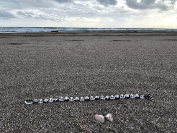 “Yin and Yang” Bracelet on romantic beach