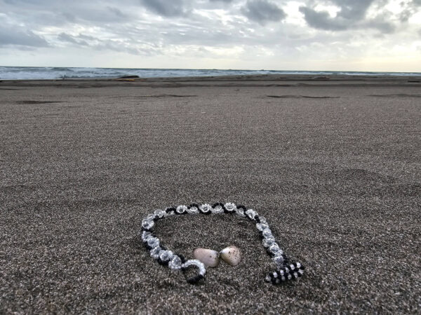 “Yin and Yang” Bracelet on the sandy beach