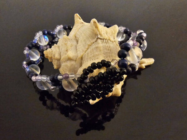 Mystical Gaze bracelet on a shell